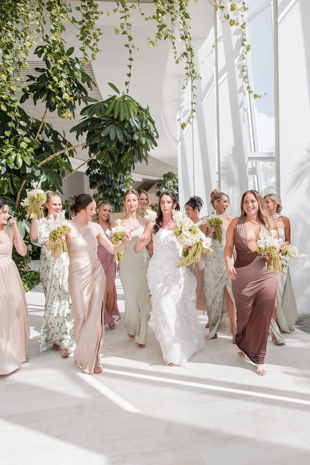 Bride and bridesmaids with white calla lily bouquets — St. Regis Kanai
